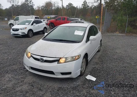 2010 Honda Civic Hybrid z USA, uszkodzony, nr VIN JHMFA3F27AS000308